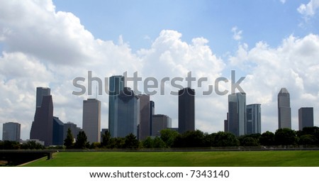 The Houston Texas Skyline on a bright cloudy day.