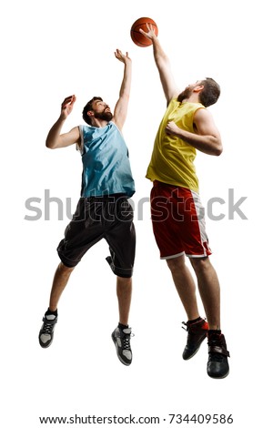 Jumping basketball players on white. Two professional sportsmen dressed in uniforms trying to get control over the ball.