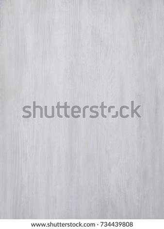 Subtle near white pickled cool grey wood board surface shows subtle grain
