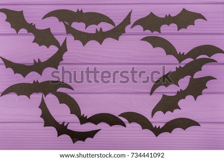 The bats halloween silhouettes cut out of paper made of round frame with. Halloween holiday. Copy space