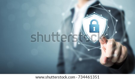 Businessman touching shield protect icon, Concept cyber security safe your data Royalty-Free Stock Photo #734461351