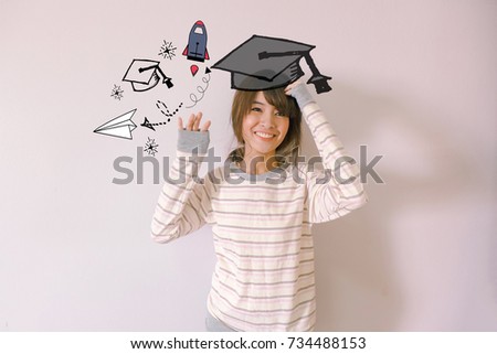 Education and graduation Concept. Young asian woman college student holding her books smiling happily with education and learning