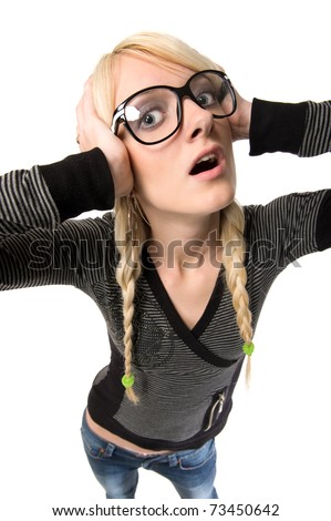 Smart young blond woman with funny glasses and plait looks like nerdy girl. Pose and looking at camera, humor style on white background.