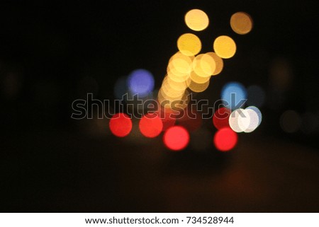 picture in colorful blurred defocused bokeh Lights. motion and nightlife concept