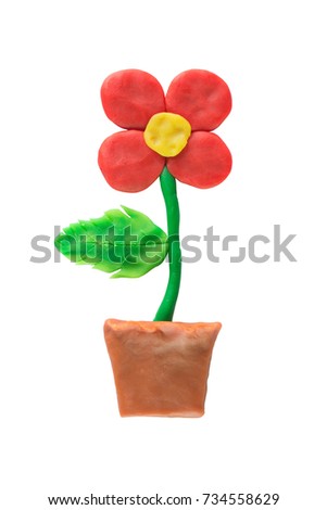 Flower made from Plasticine isolated on white background. Ecology concept.