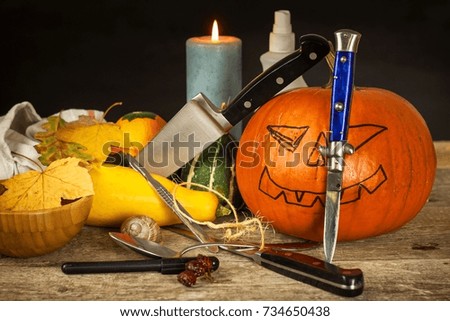 Making Jack o lantern. Carving the pumpkin. Hollowing out a scary pumpkin to prepare halloween lantern