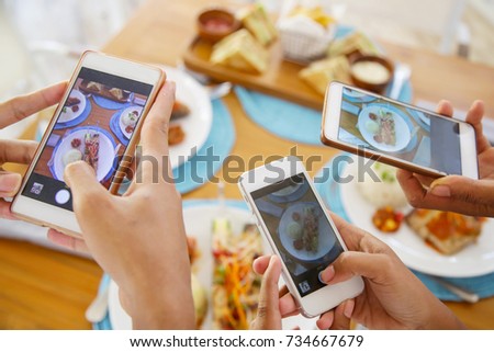 Taking a picture of lunch