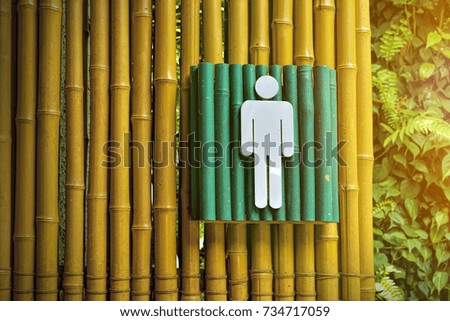 Man toilet sign in public washroom toilet