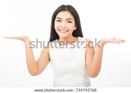 Beautiful Attractive Asian woman smile and open hand palms for display product feeling so happiness and cheerful,Isolated on white background,Beauty Concept