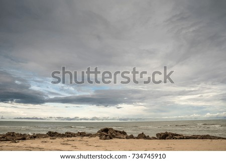 Beautiful scenic landscape with dramatic cloudy sky at sunset, Thailand.