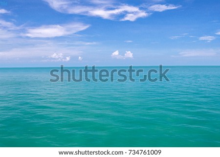 Blue sea waves surface and blue sky background