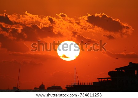 Beautiful Sunset view rich colors, City view including the sea, ships, birds, clouds and a wonderful sunset
Picture taken in Istanbul Kalamis area.  