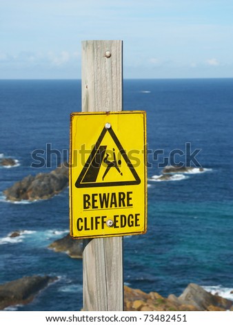Beware of Cliff Edge Sign at Booti Booti National Park of Australia.