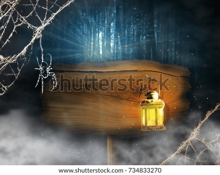 Halloween background with wooden board, lantern and spider cob