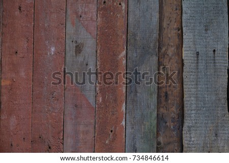 Vintage wooden fence in the village. Background vintage texture