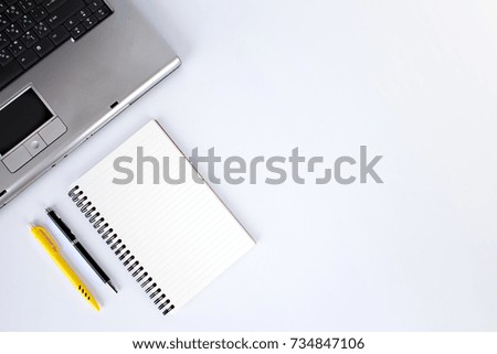 notebook with pen on white background, Top view with copy space