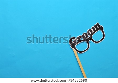  Wedding or party accessories set on blue background.Selective focus.