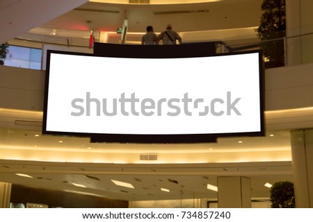 Billboard in the empty building of the shopping mall.