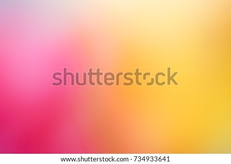 Abstract defocused orange and pink circular light pattern 