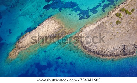 Aerial bird's eye view photo taken by drone of Caribbean tropical rocky seascape with turquoise - sapphire waters