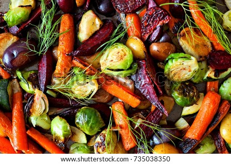 Full background of roasted colorful autumn vegetables, above view Royalty-Free Stock Photo #735038350