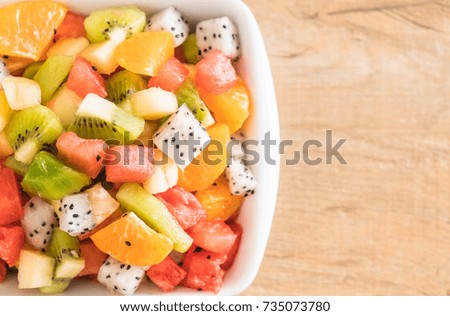 mix sliced fruits (orange, dragon fruit, watermelon, pineapple, kiwi)