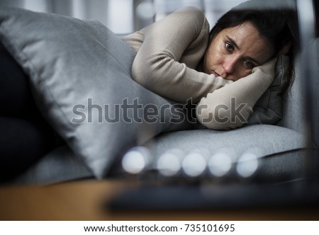 Depressed woman Royalty-Free Stock Photo #735101695