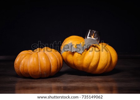 autumn holiday, a large pumpkin, candles, dry grass, Halloween, a mesmerizing picture