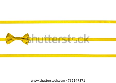 Three lemon yellow silk thin ribbons with bows on left isolated on white