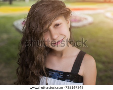Summer happiness, teen smile and joy closeup. Teenage girl portrait, park background. Natural beauty, joyful concept
