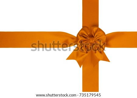 Single thin gift orange silk bow with cross ribbons isolated on white 
