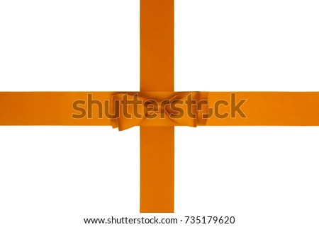 Single thin gift orange silk bow with cross ribbons on white background