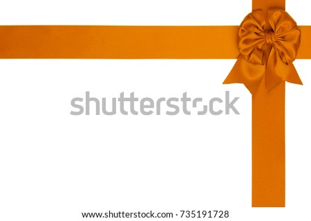 Single gift silk bow of orange color, cross ribbon isolated on white