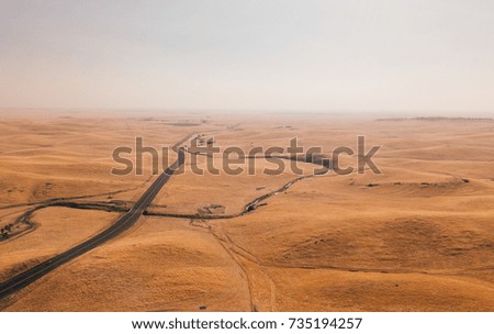 Beautiful aerial view of the yellow fields in California. View from above