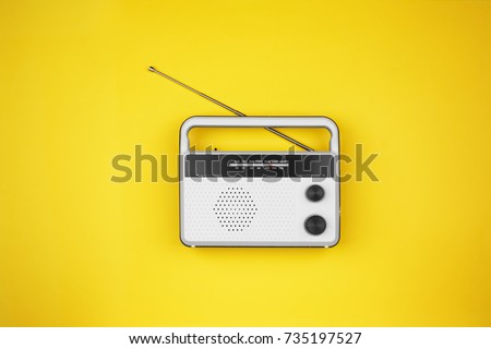 Radio receiver on color background Royalty-Free Stock Photo #735197527