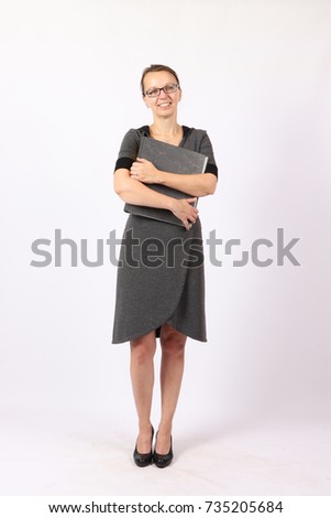 Business woman with a office ring binder on a white background