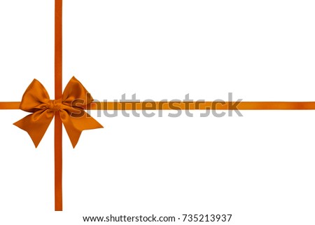 Single orange satin gift bow with tails with cross thin ribbons on white background  