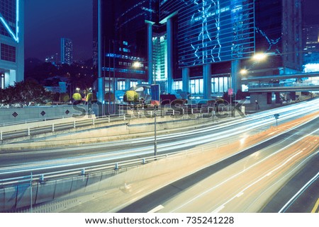 traffic trails in downtown hong kong,china,asia.