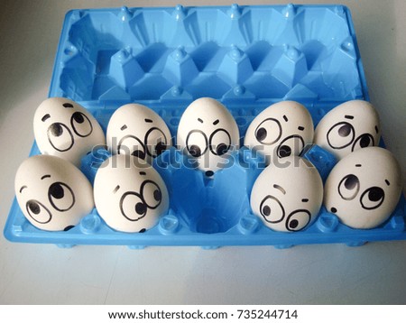 discharge concept. quit work. bankruptcy. photo for your design. funny eggs in a box