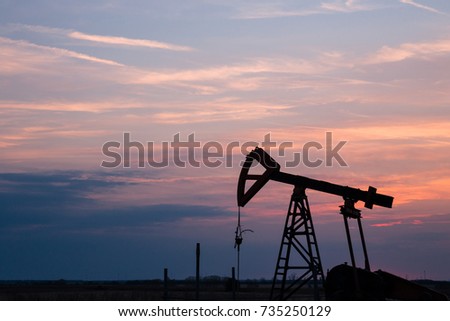 Bulgaria, Shabla - Sunset view of a oil pumpjack