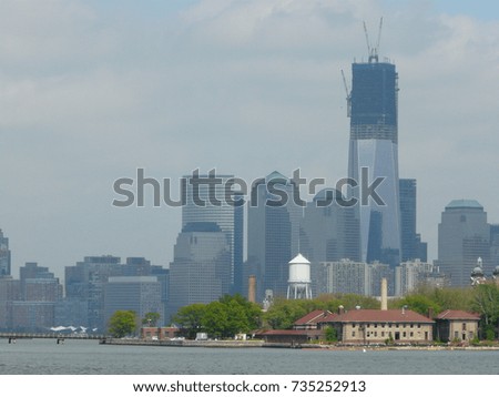Downtown NYC viewed from the other side on a spring day while building the new tower