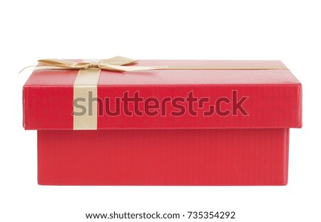 Red gift box with golden bow, a gift, present, surprise. 