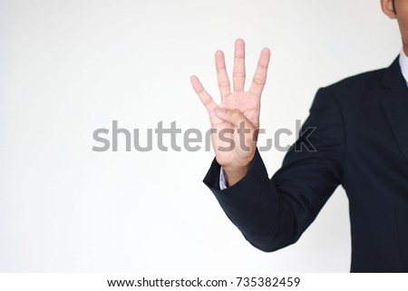 Show hand counting four,About sequence. (selective focus,out of focus) Royalty-Free Stock Photo #735382459