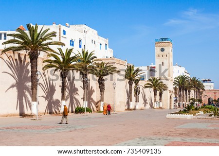 Medina entrance tower and old city walls in Essaouira, Morocco Royalty-Free Stock Photo #735409135
