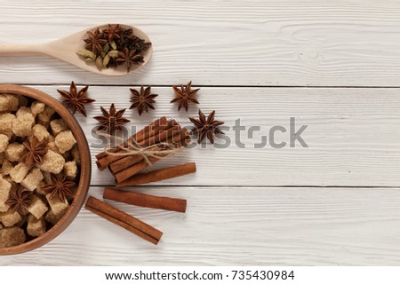 ingredients for mulled wine on white wooden table