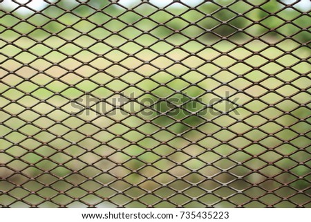 cage metal in front of garden