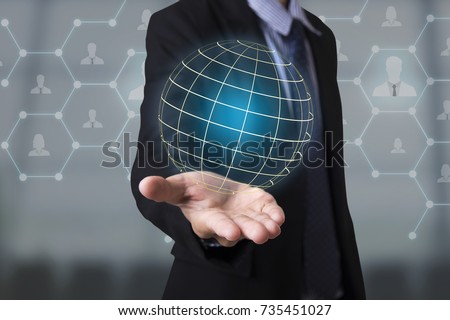Business hand with application icon interface and globe networking system. concept technology social network communication.