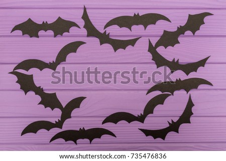 The bats halloween silhouettes cut out of paper made of round frame with. Halloween holiday. Copy space