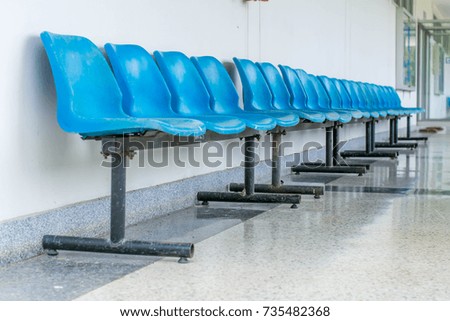 Blue chairs on tile floor