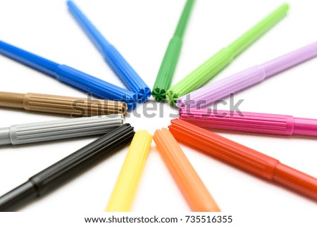 Colorful circle markers on white background side view